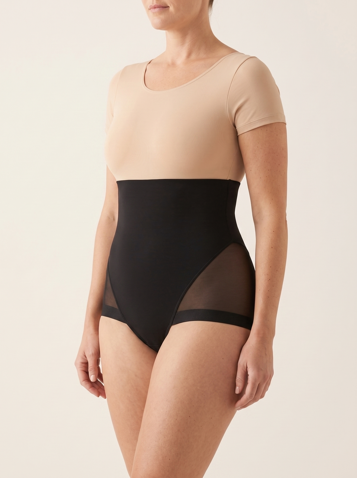 AI-generated model wearing the AirCurve mesh-panel high-waist shaping brief in Black, side view view