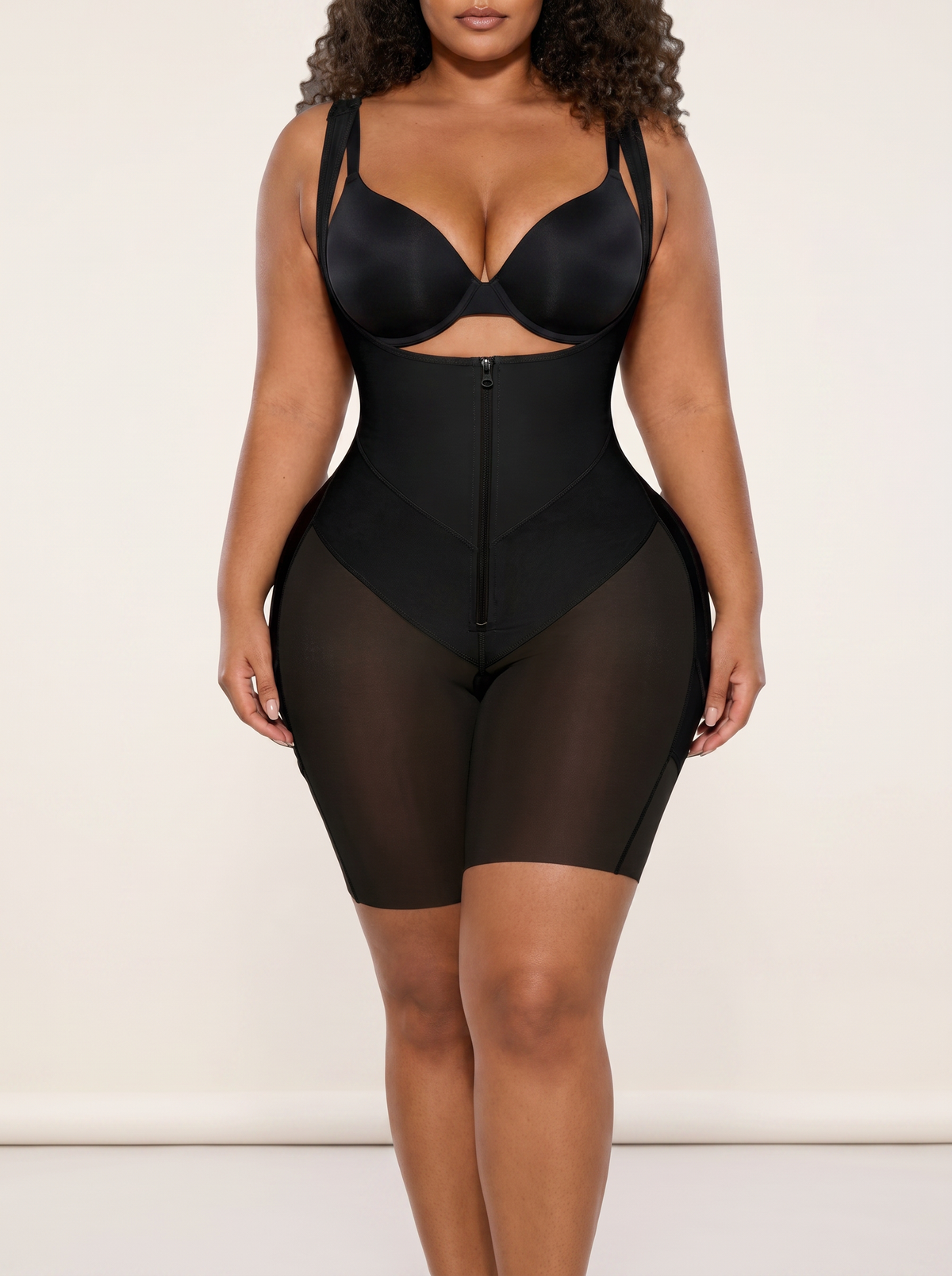 AI-generated model wearing the FlexFit open-bust zip-front mid-thigh bodysuit in Black, straight-front detail view