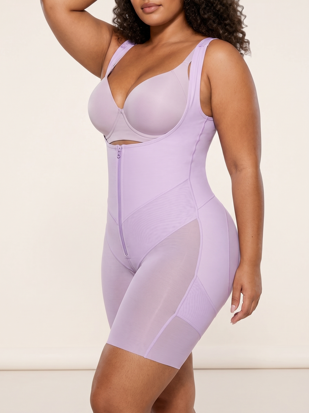 AI-generated model wearing the FlexFit open-bust zip-front mid-thigh bodysuit in Light Purple, side view view
